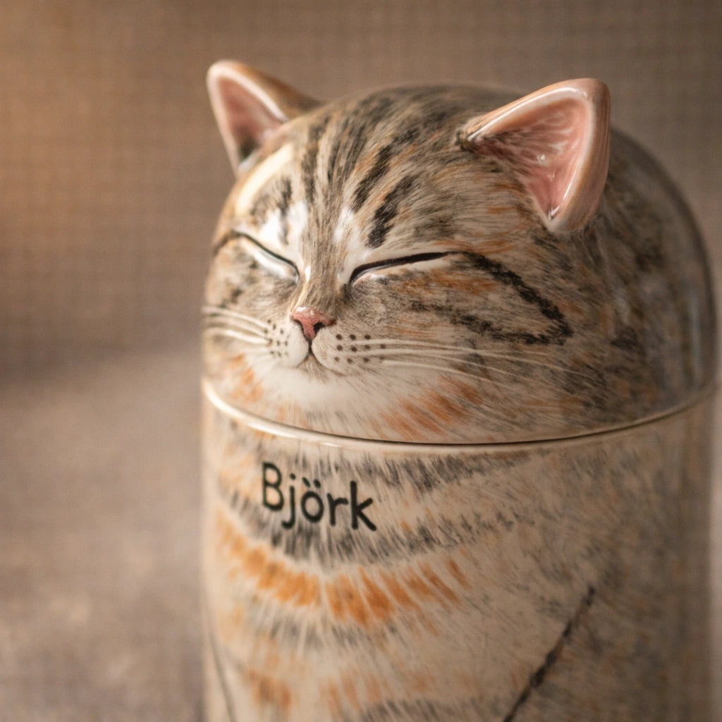 Custom ceramic pet urn for cats with tabby surface detailing