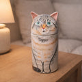 Handmade personalized cat urn with painted portrait and name 'Tigger', custom pet memorial for home
