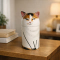 Handmade personalized cat urn with painted calico face, ceramic pet memorial for home decor