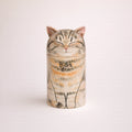 Personalized ceramic tabby cat urn with closed eyes and name inscription