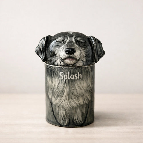 Handmade ceramic dog urn with detailed fur carving
