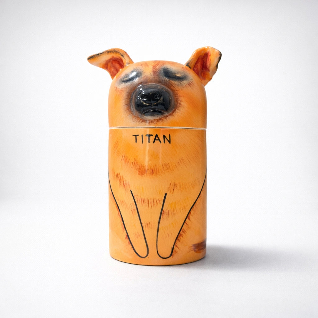 Minimal ceramic dog urn with balanced proportions and warm tones