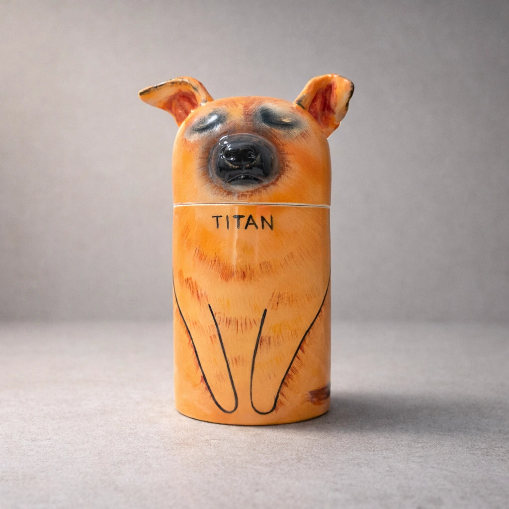 Ceramic dog urn designed for quiet home placement