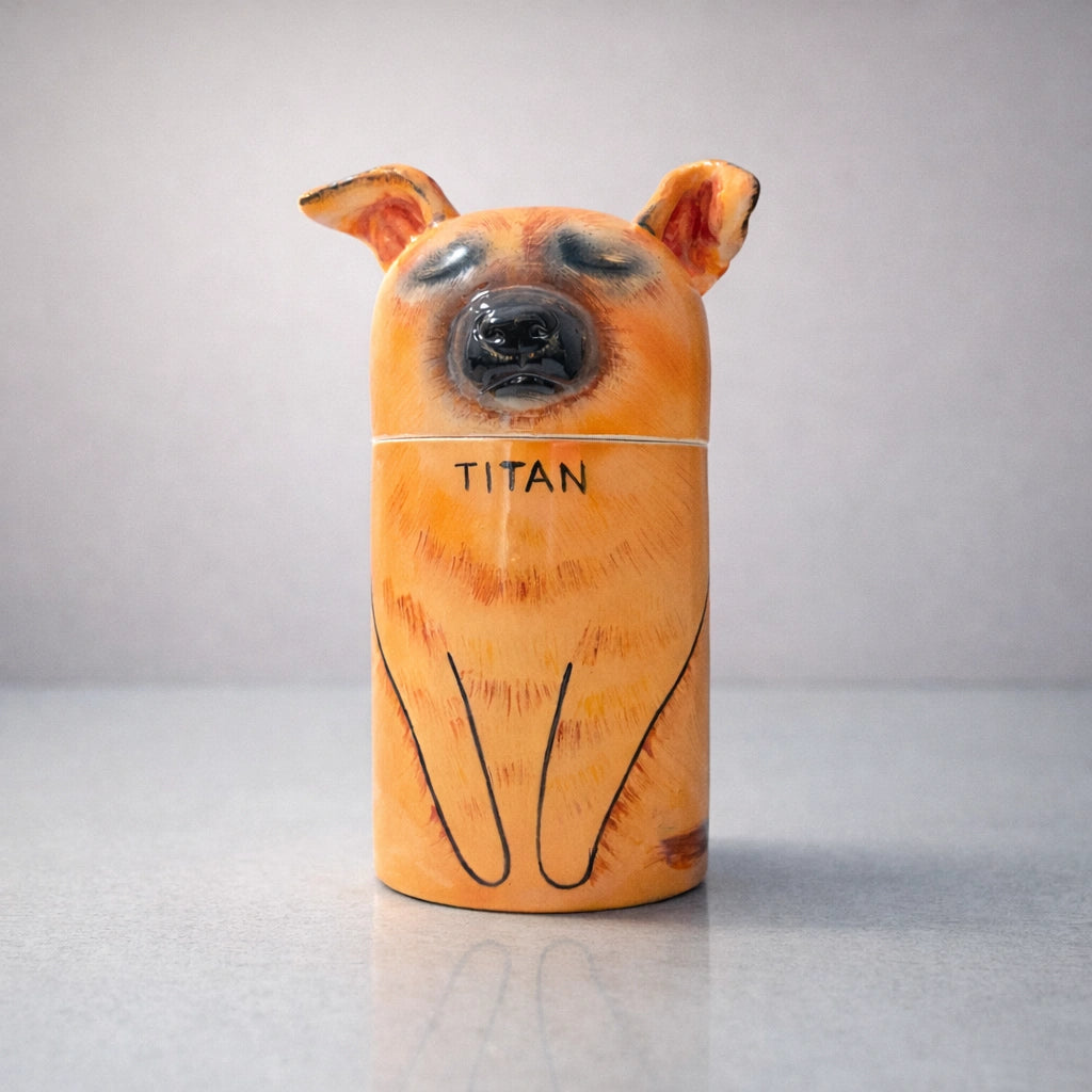 Handmade ceramic dog urn with smooth sculpted surface