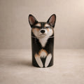 Dog-shaped container on a beige background