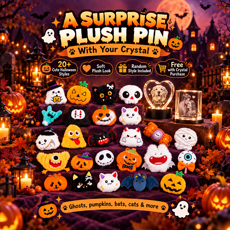 Assorted Halloween plush pins with pumpkin, ghost, cat, monster, and bat designs